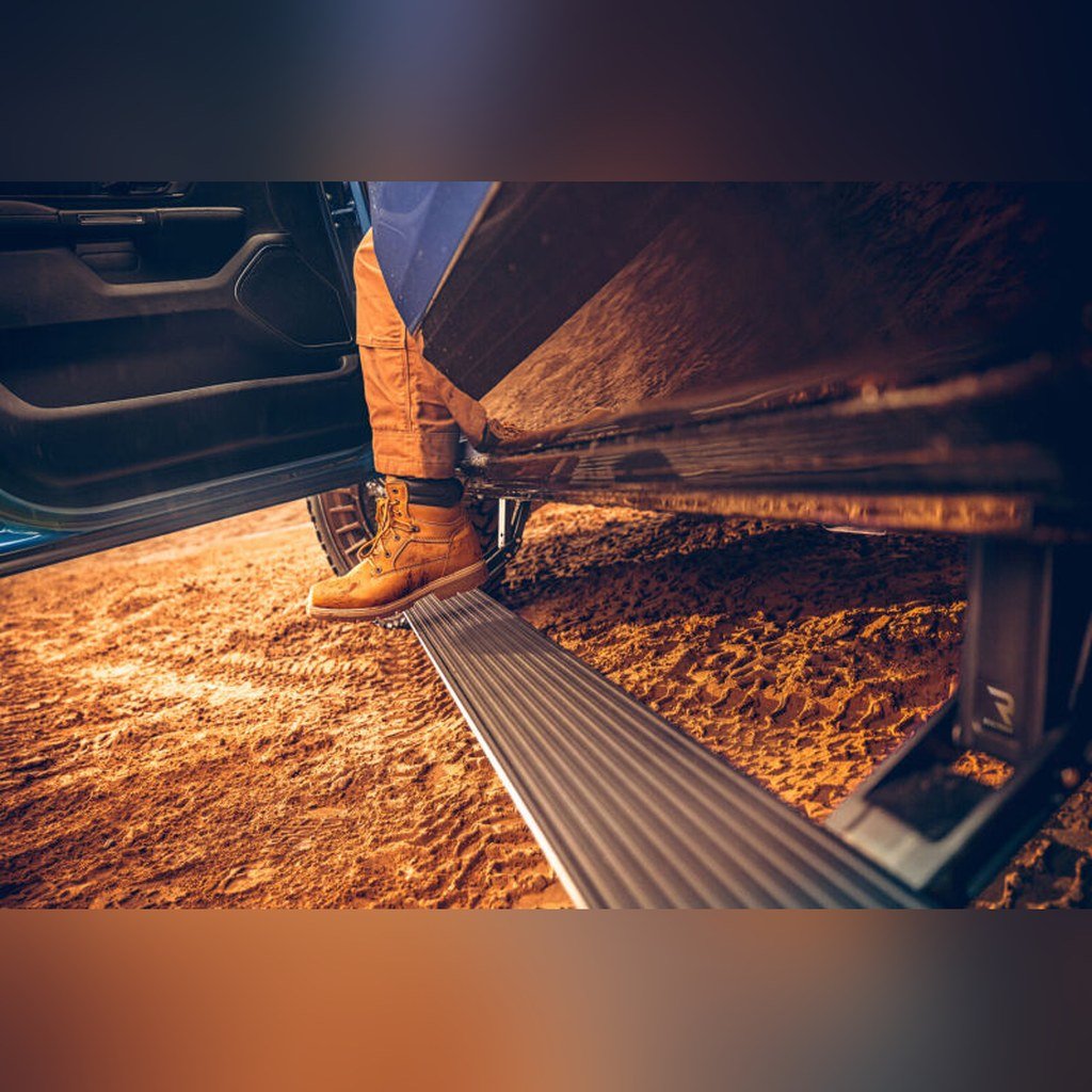AMP Research PowerStep Plug N Play Retractable Running Boards - Black w/ OEM Illumination | 2021-2024 Ram 1500 TRX - Stateside Performance - Running Boards - AMP Research - AMP Research PowerStep Plug N Play Retractable Running Boards - Black w/ OEM Illumination | 2021-2024 Ram 1500 TRX