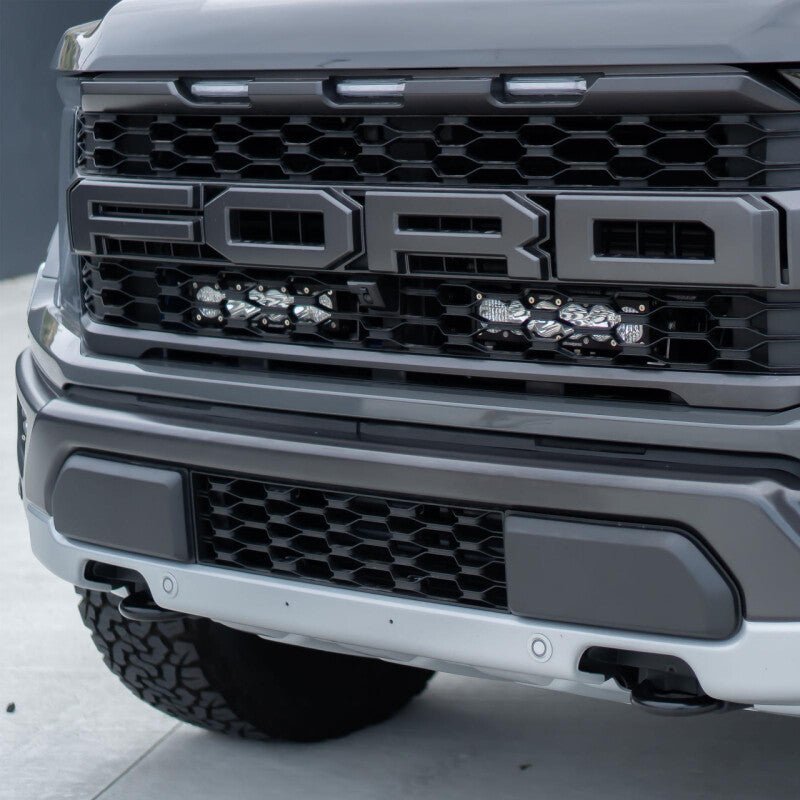 Baja Designs OnX6 Behind Grill Kit - 10in Clear D/C | 2021-2025 Ford F150 Raptor - Stateside Performance - Light Bars & Cubes - Baja Designs - Baja Designs OnX6 Behind Grill Kit - 10in Clear D/C | 2021-2025 Ford F150 Raptor