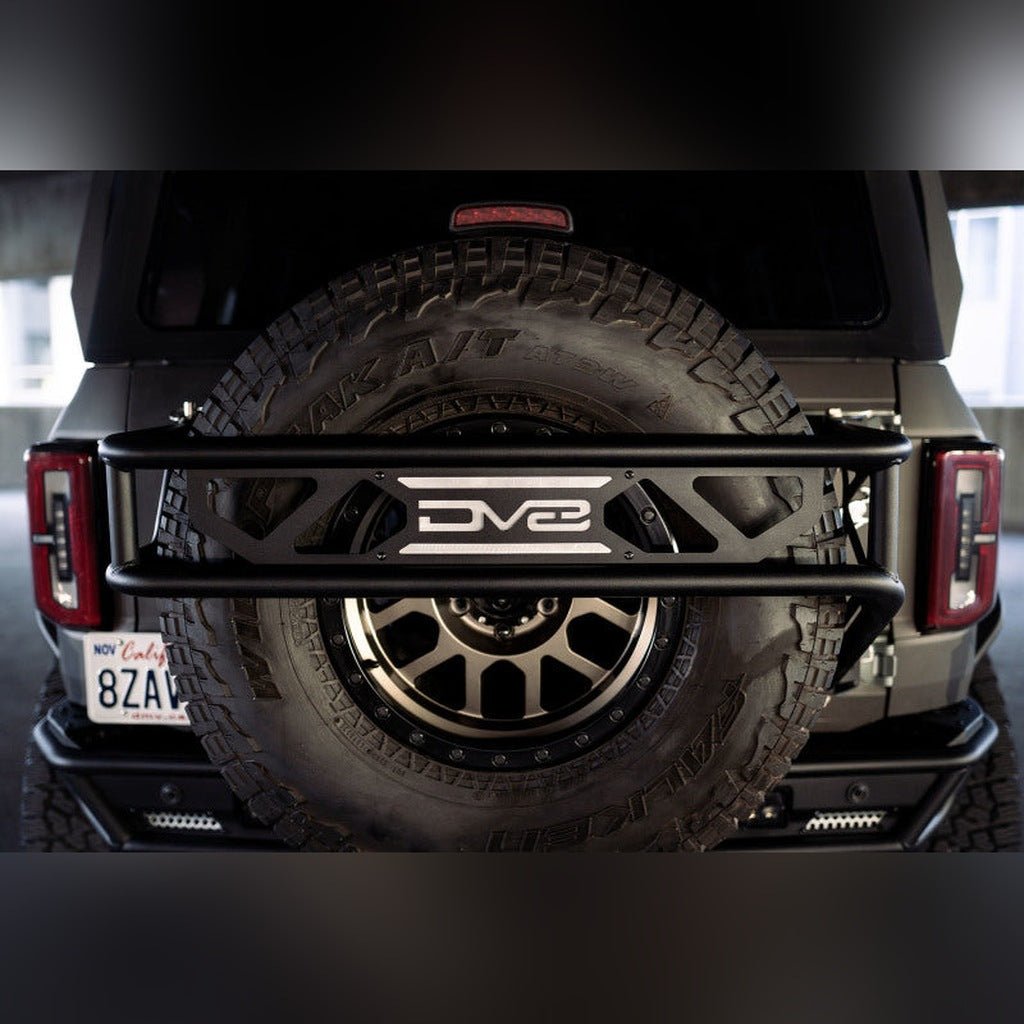 DV8 Offroad Spare Tire Guard & Accessory Mount | 2021 - 2025 Ford Bronco - Stateside Performance - Hitch Receivers - DV8 Offroad - DV8 Offroad Spare Tire Guard & Accessory Mount | 2021 - 2025 Ford Bronco