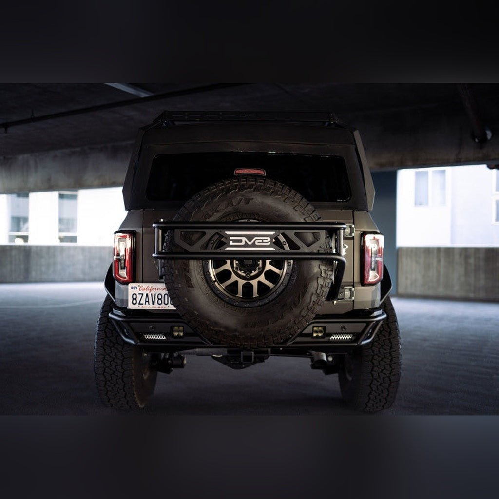 DV8 Offroad Spare Tire Guard & Accessory Mount | 2021 - 2025 Ford Bronco - Stateside Performance - Hitch Receivers - DV8 Offroad - DV8 Offroad Spare Tire Guard & Accessory Mount | 2021 - 2025 Ford Bronco