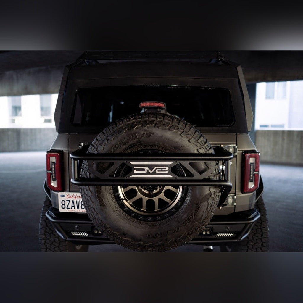 DV8 Offroad Spare Tire Guard & Accessory Mount | 2021 - 2025 Ford Bronco - Stateside Performance - Hitch Receivers - DV8 Offroad - DV8 Offroad Spare Tire Guard & Accessory Mount | 2021 - 2025 Ford Bronco