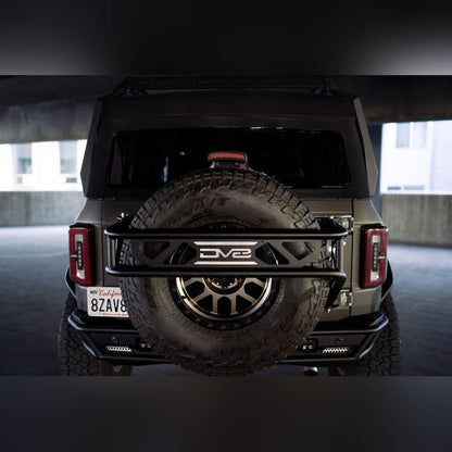 DV8 Offroad Spare Tire Guard & Accessory Mount | 2021 - 2025 Ford Bronco - Stateside Performance - Hitch Receivers - DV8 Offroad - DV8 Offroad Spare Tire Guard & Accessory Mount | 2021 - 2025 Ford Bronco
