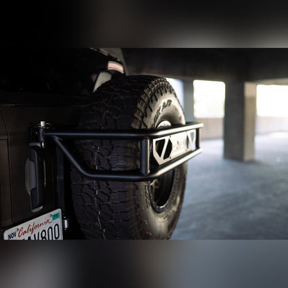 DV8 Offroad Spare Tire Guard & Accessory Mount | 2021 - 2025 Ford Bronco - Stateside Performance - Hitch Receivers - DV8 Offroad - DV8 Offroad Spare Tire Guard & Accessory Mount | 2021 - 2025 Ford Bronco