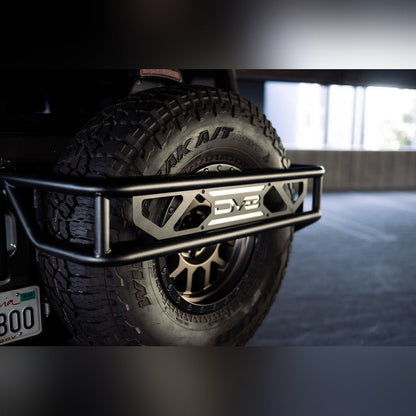 DV8 Offroad Spare Tire Guard & Accessory Mount | 2021 - 2025 Ford Bronco - Stateside Performance - Hitch Receivers - DV8 Offroad - DV8 Offroad Spare Tire Guard & Accessory Mount | 2021 - 2025 Ford Bronco