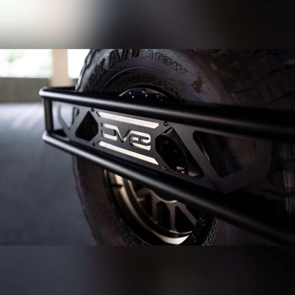 DV8 Offroad Spare Tire Guard & Accessory Mount | 2021 - 2025 Ford Bronco - Stateside Performance - Hitch Receivers - DV8 Offroad - DV8 Offroad Spare Tire Guard & Accessory Mount | 2021 - 2025 Ford Bronco