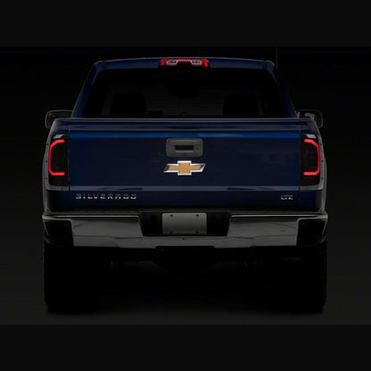 Raxiom Axial Series LED Tail Lights - Black Housing, Smoked Lens | 2015-2019 Chevy Silverado 3500HD